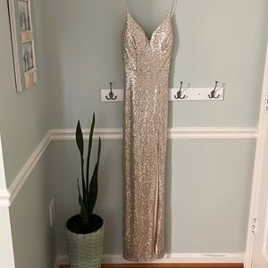 Shiny champagne/tan dress. Size small. Slit on left leg. Perfect for NYE event.